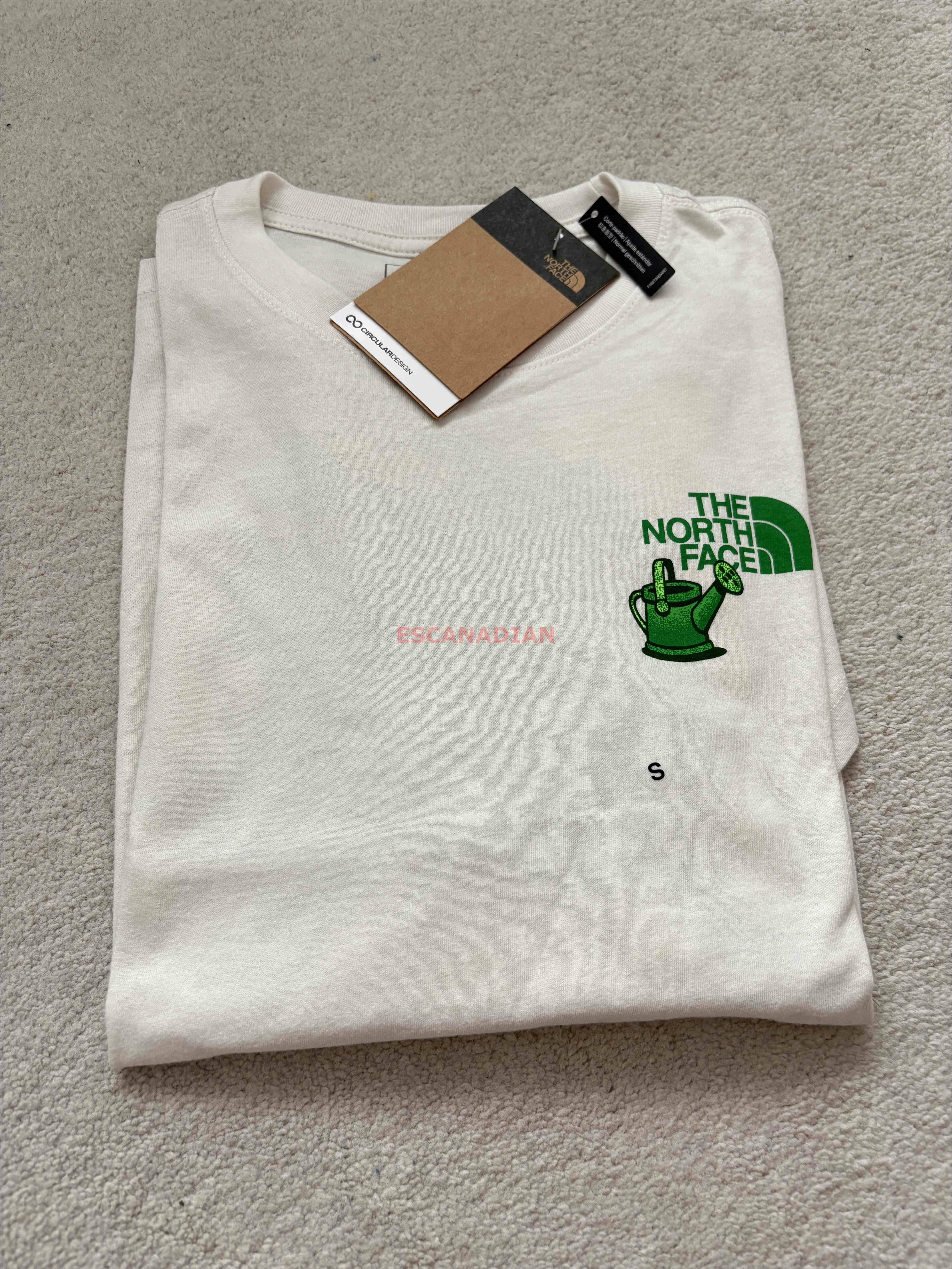 THE NORTH FACE 女大人 雙面圖案 短TEE (前小後大)