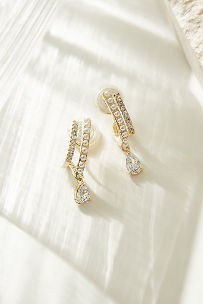 雙線條垂墜單鑽。夾式耳環