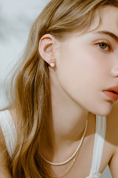 低調輕奢。夾式耳環