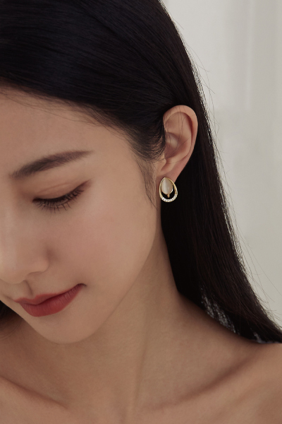 水滴貓眼鋯石。夾式耳環