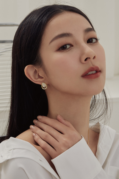 水滴貓眼鋯石。銀針耳環