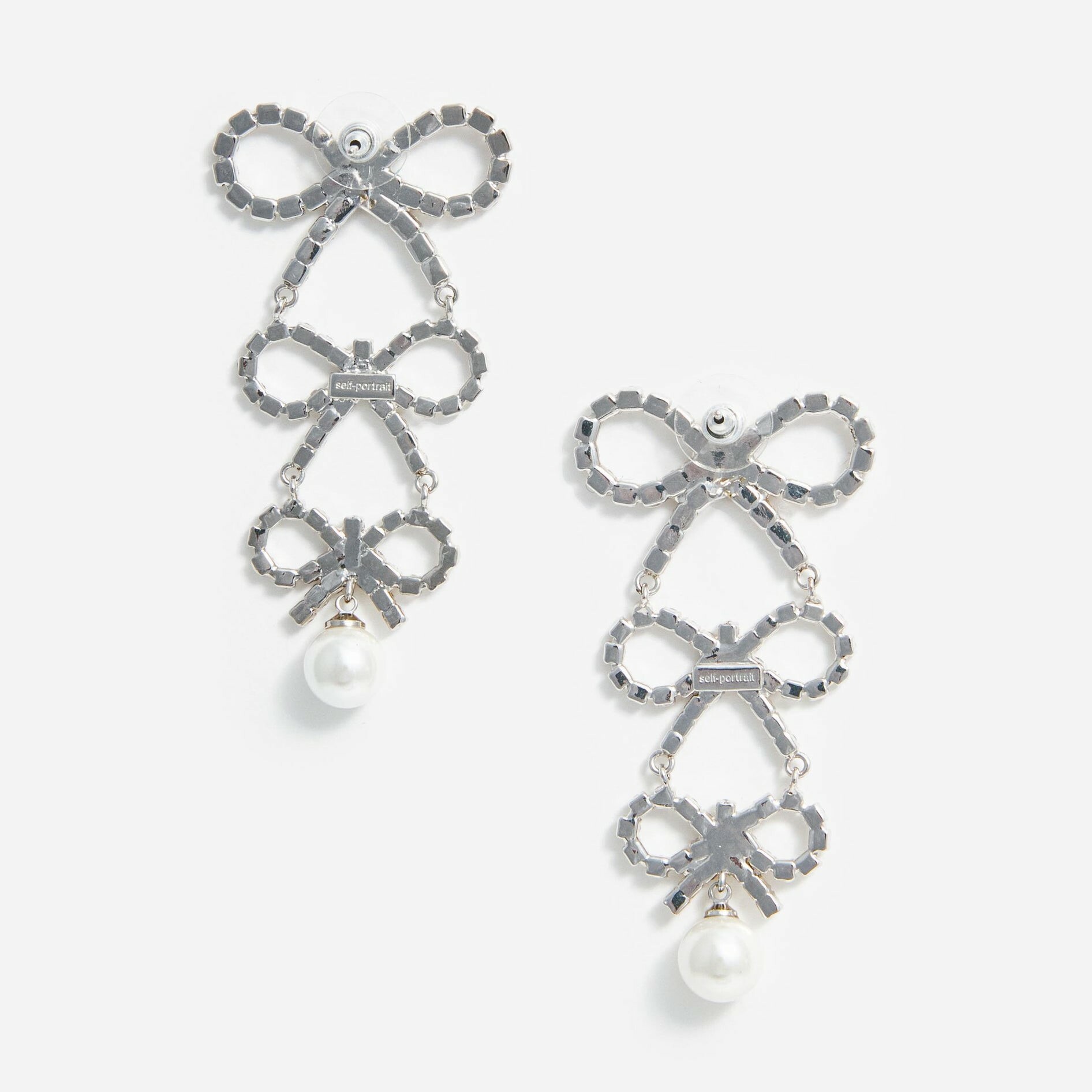 1SP0102-019 SELF PORTRAIT Tiered Crystal Bow Earrings #AW24602SL-SILVER (A-NB-E)