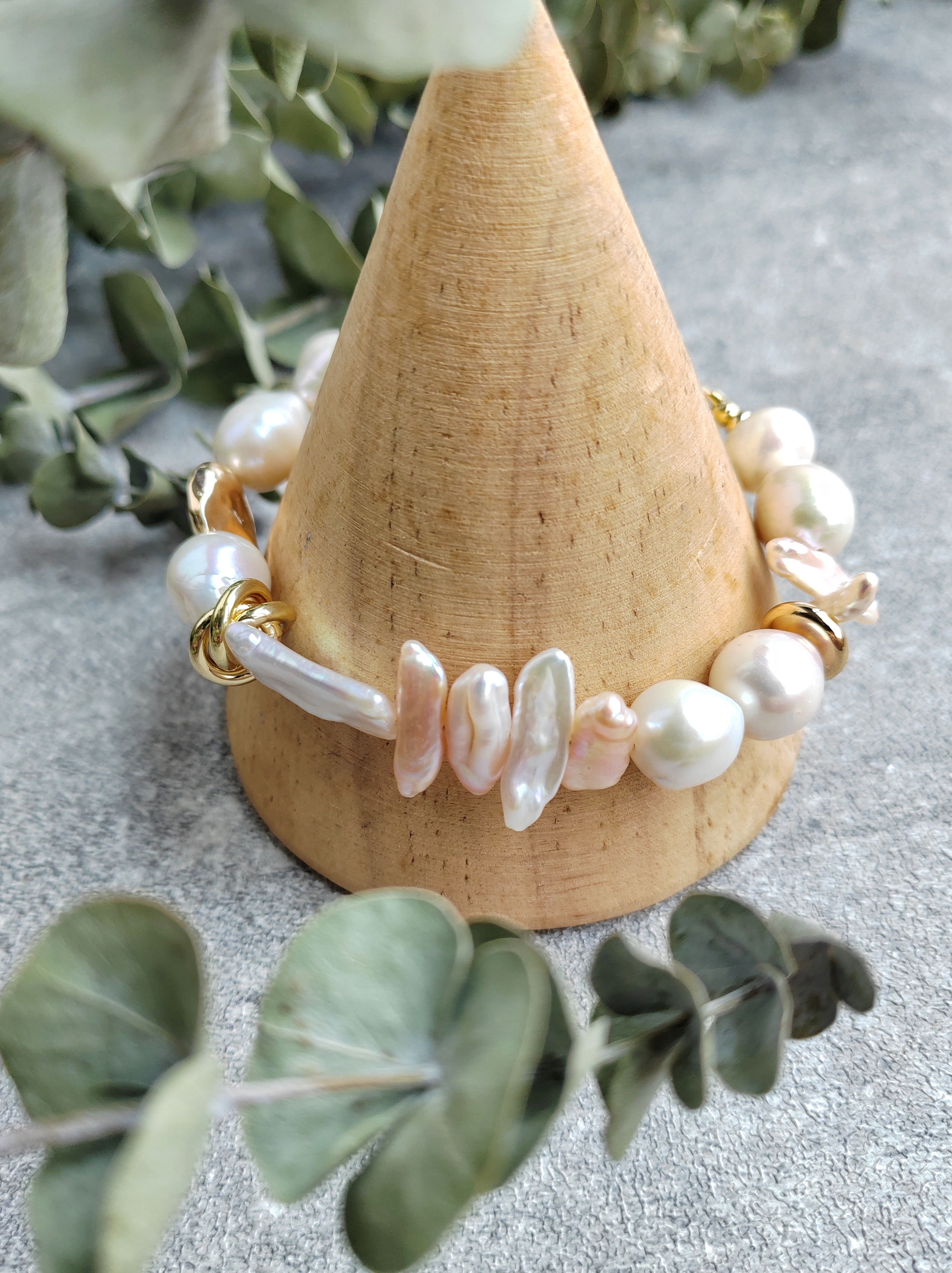 Handcrafted baroque pearl bracelet with gold accents, featuring unique, natural pearls for timeless elegance