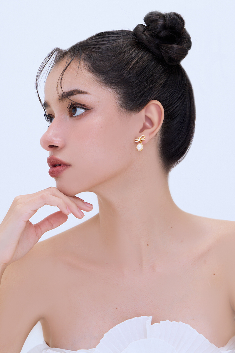法式珍珠蝴蝶結。夾式耳環