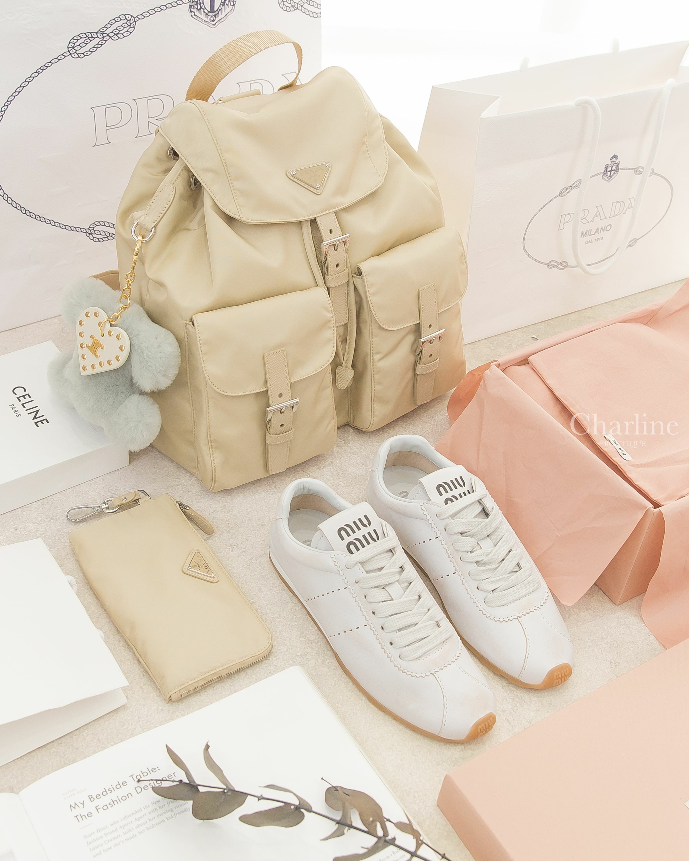 Prada Medium Backpack 沙漠棕三角銀字Logo中型拉鍊小包尼龍手提後背包,Miu Miu Plume 白色黑字棕色橡膠鞋底運動鞋,Celine 泥土藍毛絨凱旋門愛心綴飾金釦鑰匙圈-Charline Boutique 精品代購