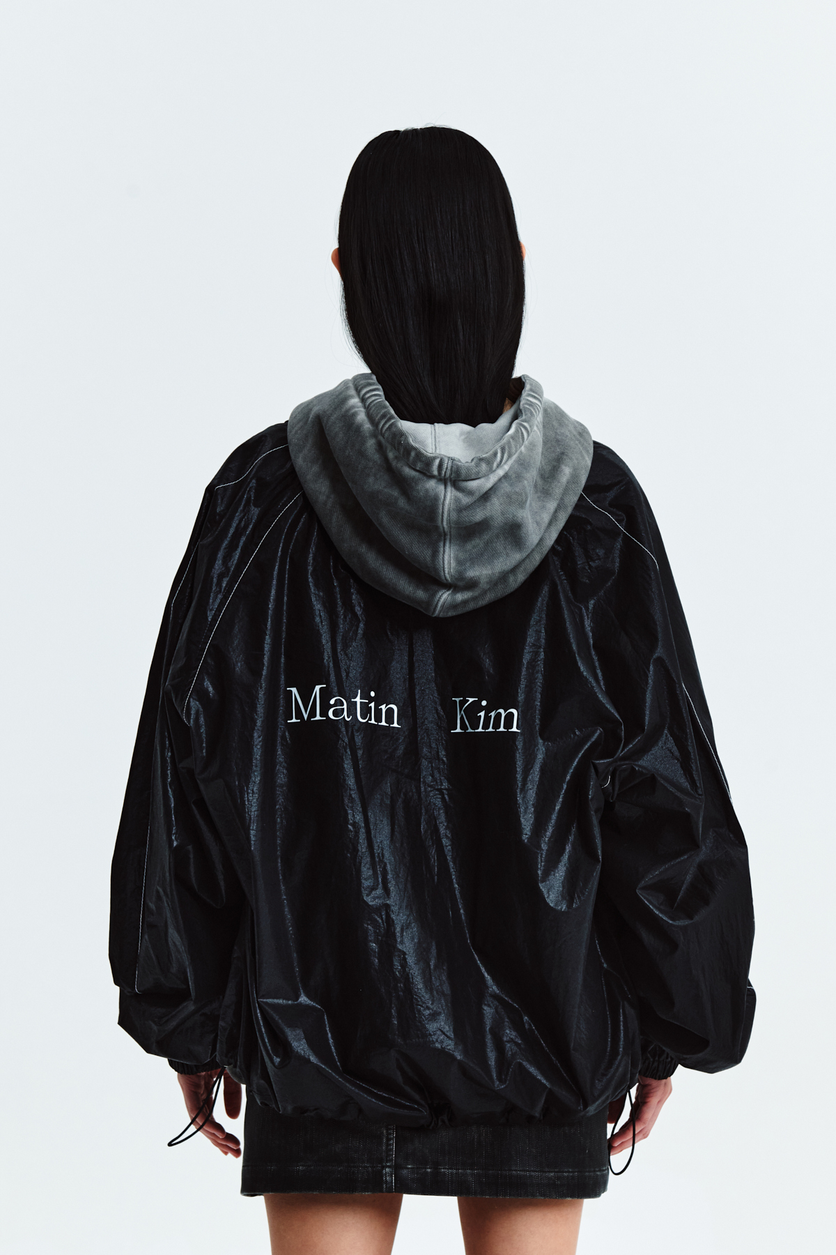 MATIN KIM LOGO COATING JUMPER IN BLACK