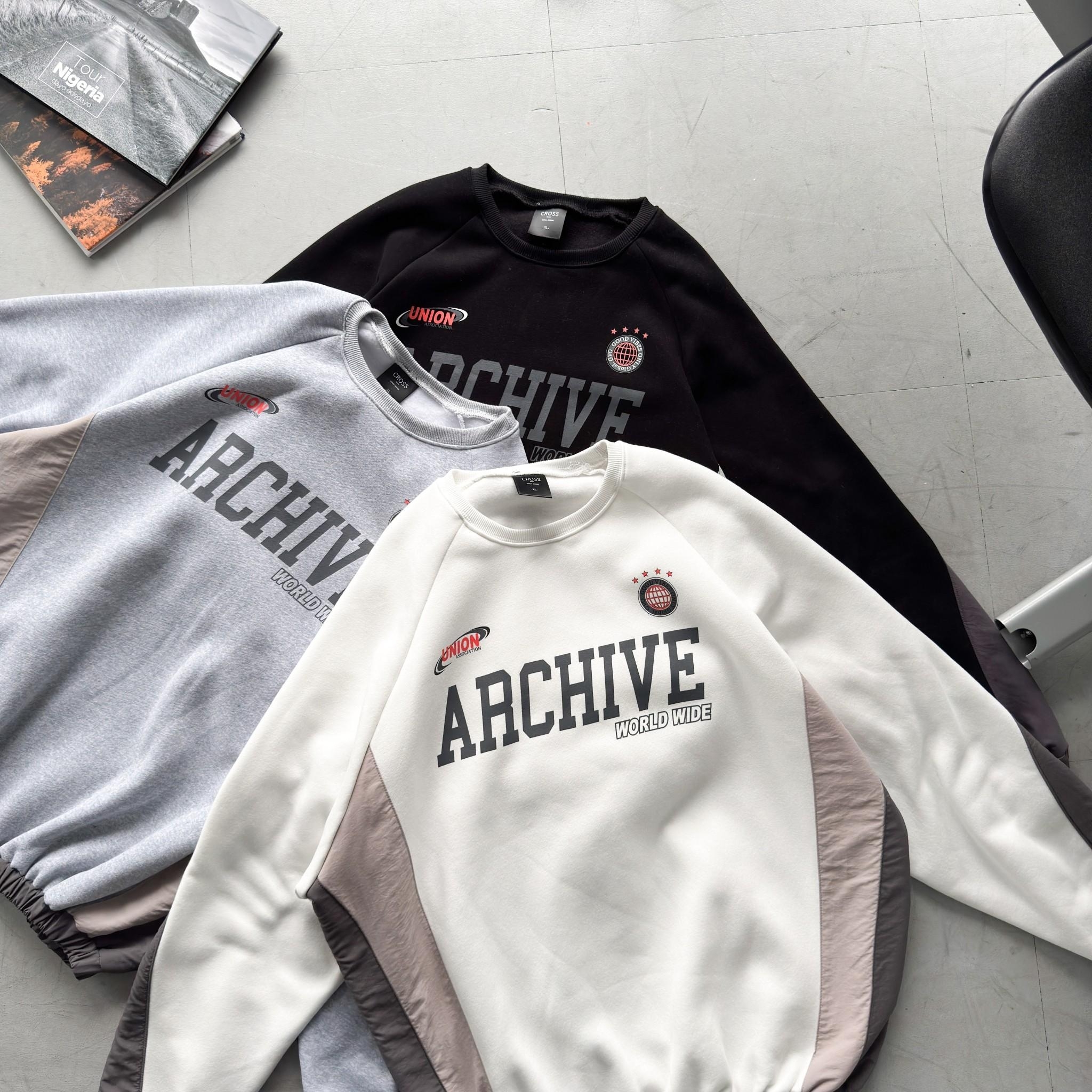 Archive 拼接下擺縮口大學T 98253