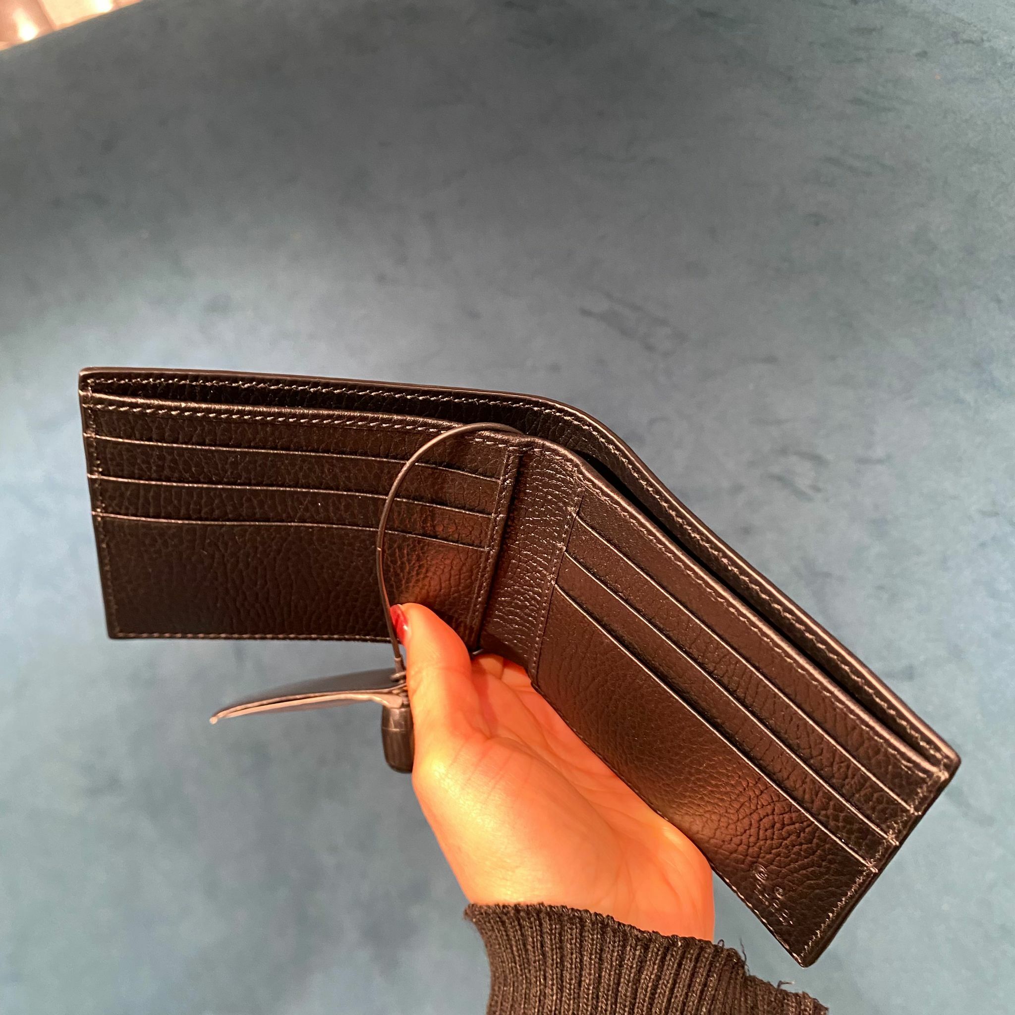 Gucci Dollar calf bi-fold men wallets in black