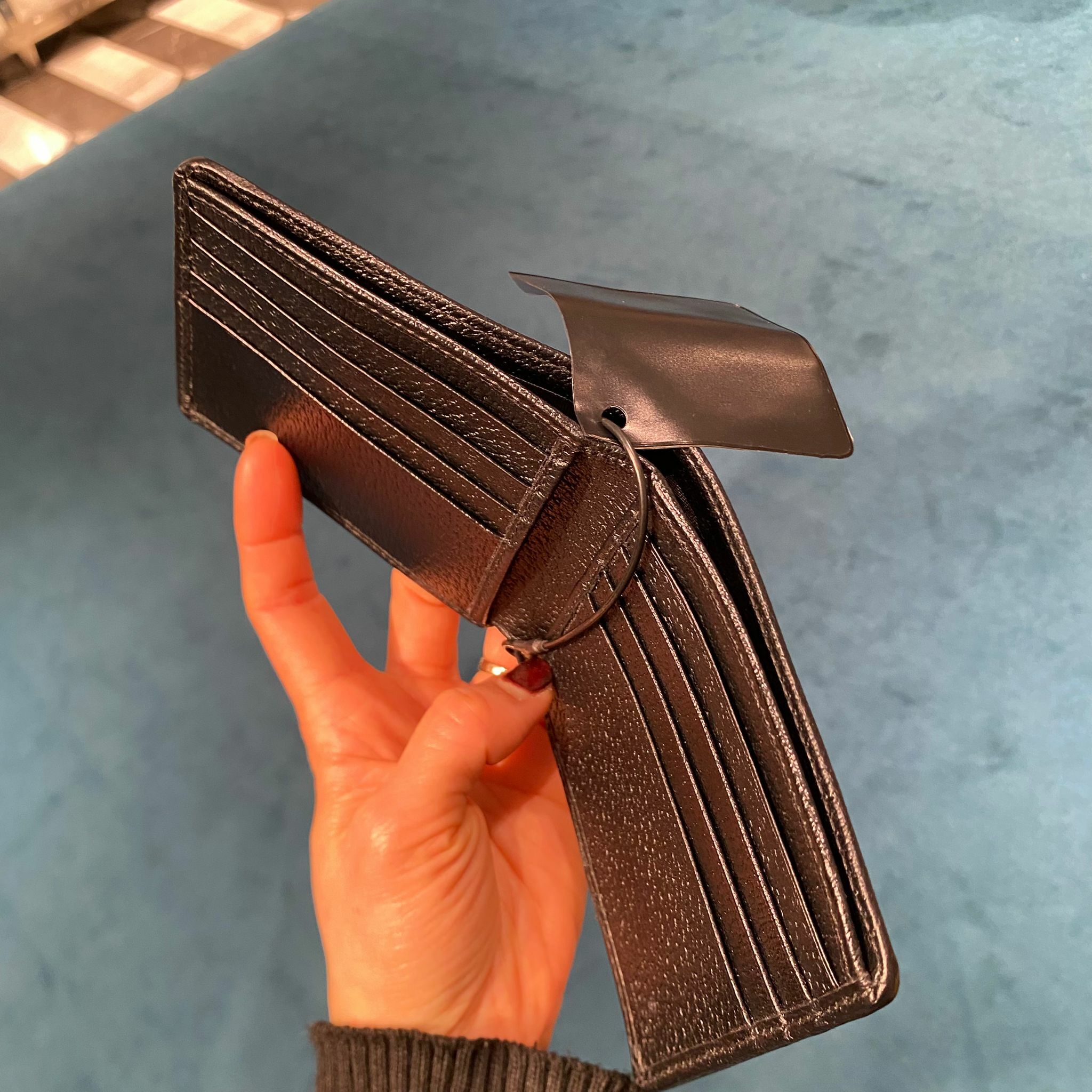 Gucci Jumbo GG canvas dollar bi-fold wallet in black