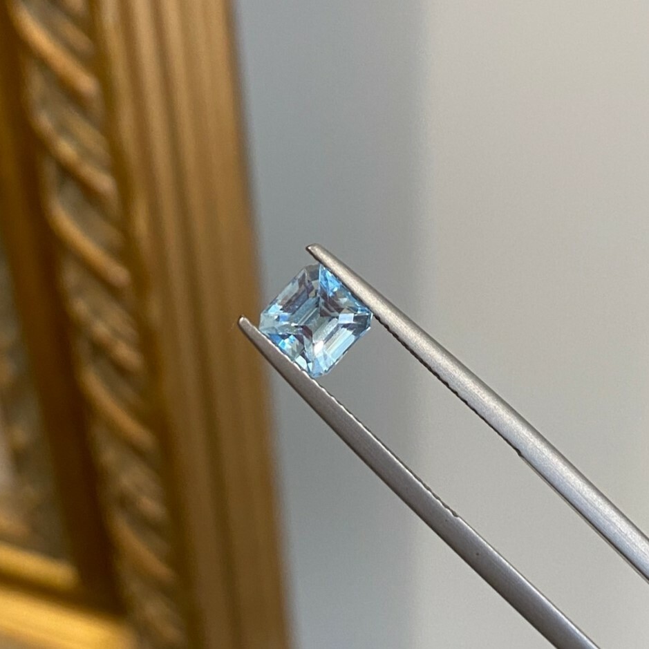 A 1.36 carat asscher-cut deep blue aquamarine.