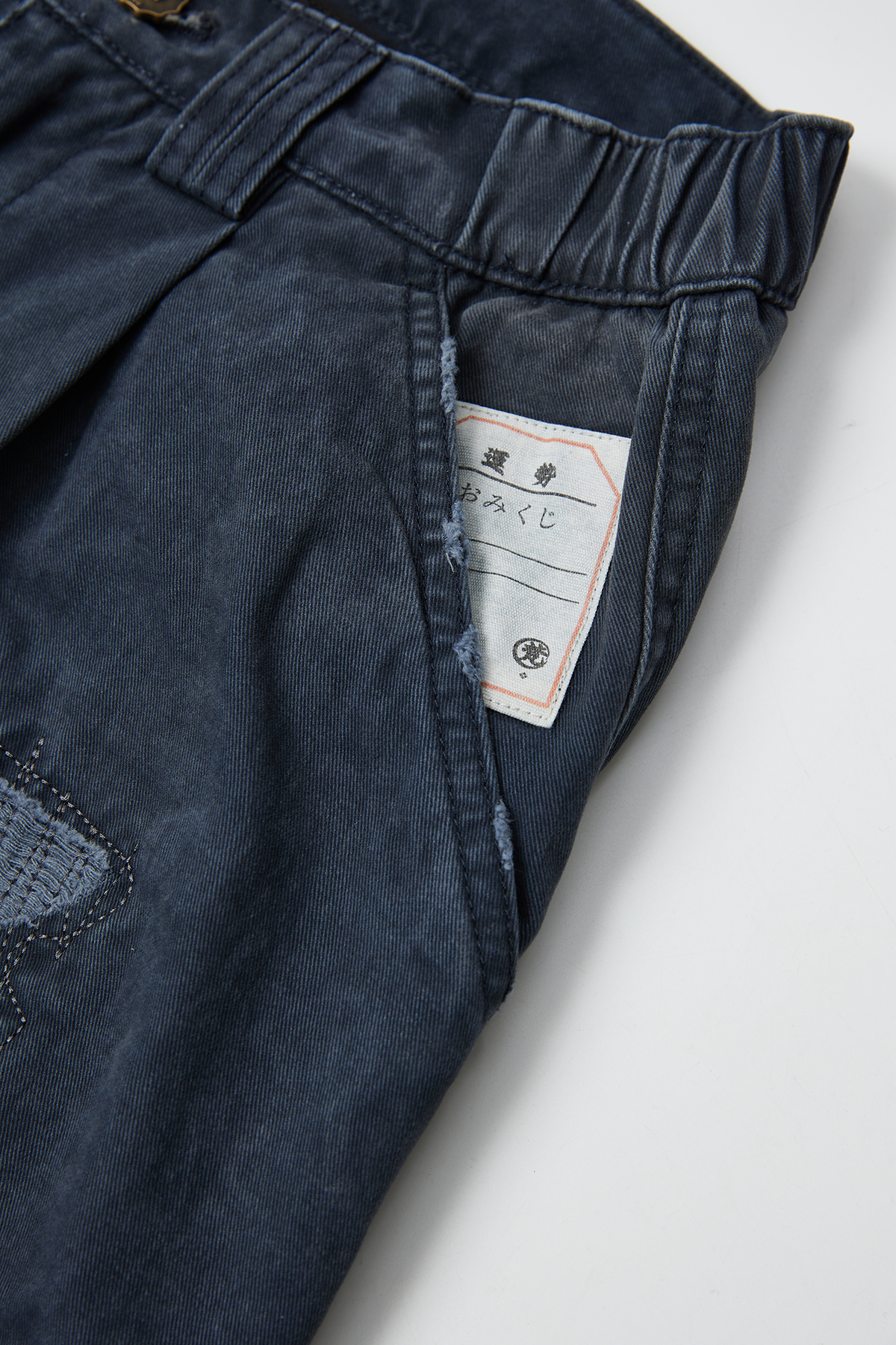 Fumble 洗水碧紋布斜袋闊褲