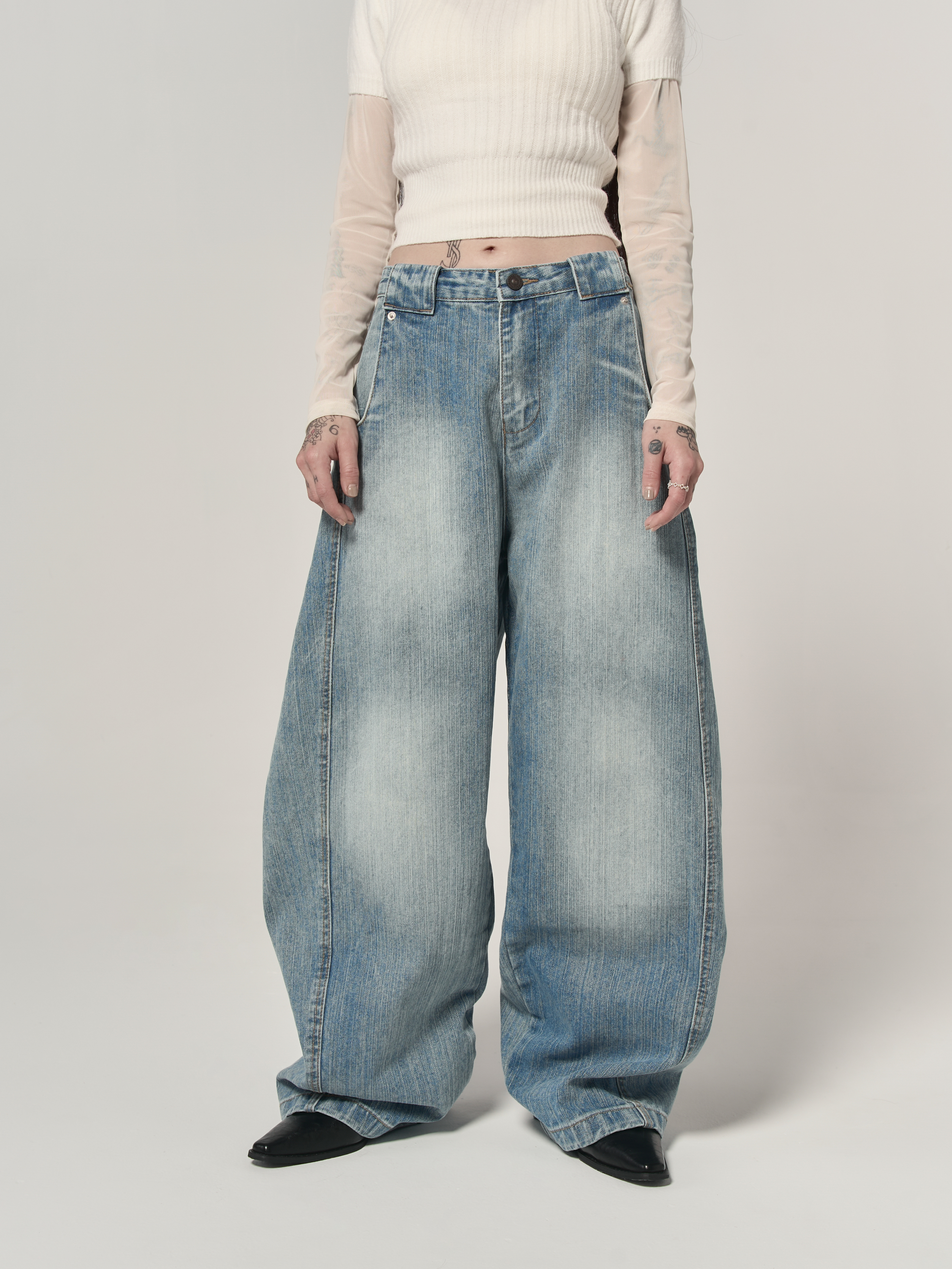 淺藍刷白寬彎刀褲