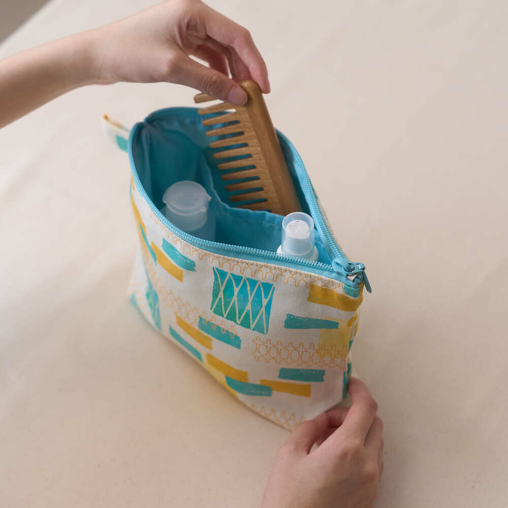 印花樂拉鏈梯形收納包