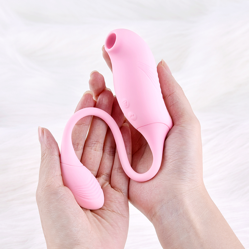 EROCOME Tucana sucking + vibrating double-headed massager - Pink