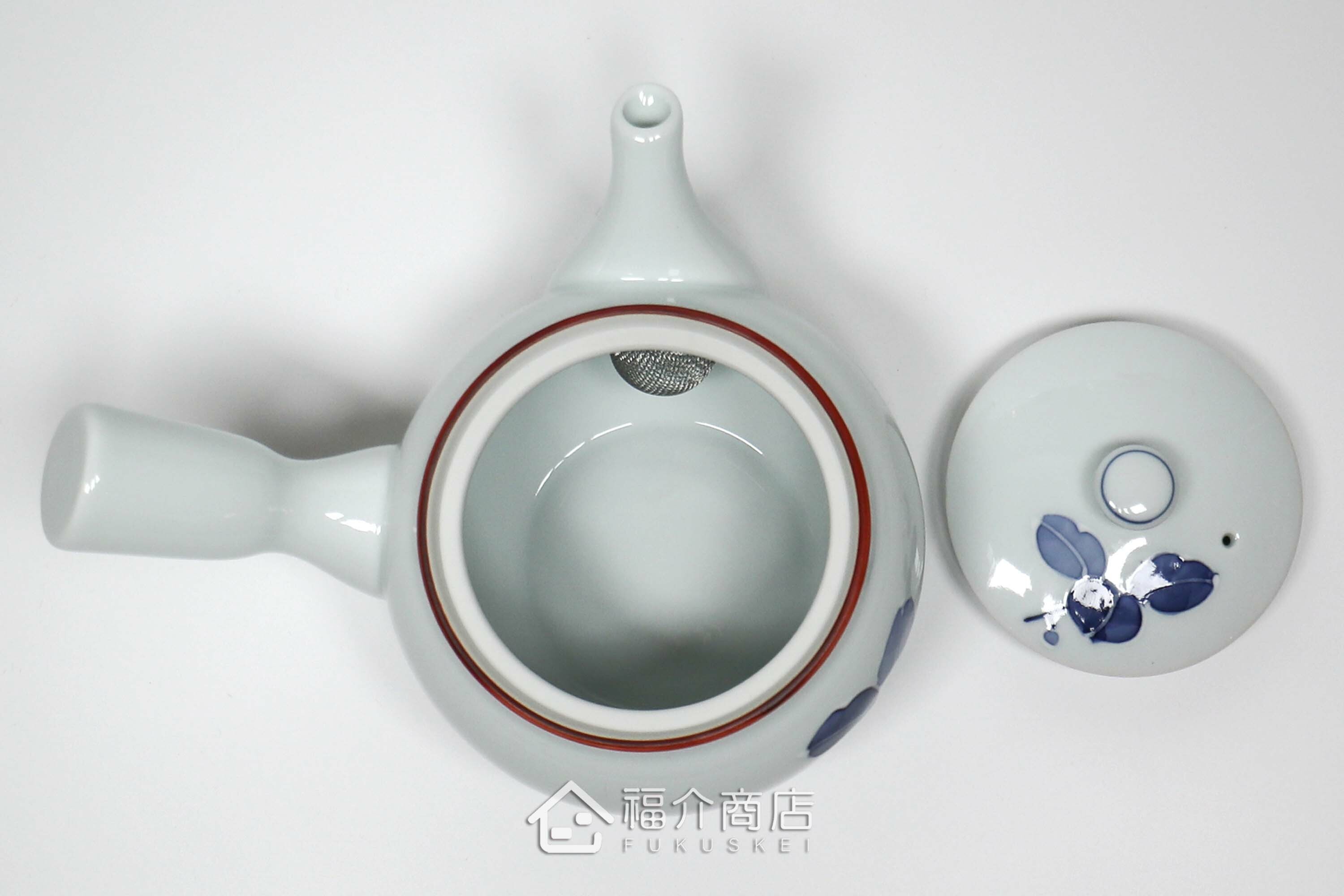 泡茶用的400㏄白色陶茶壺上面有青色花瓣造型