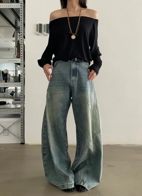 接骨水洗重磅彎刀牛仔褲