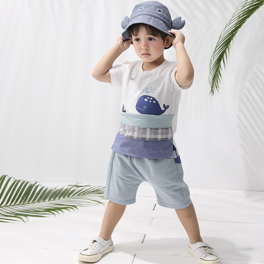 PIPPY 可愛噴水小鯨魚下擺異材質剪接短袖上衣 米白