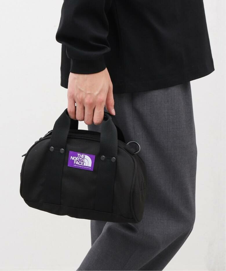 The North face 日本限定紫標 圓筒小包