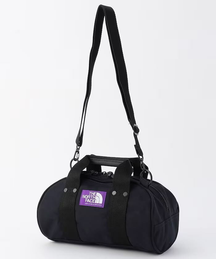 The North face 日本限定紫標 圓筒小包