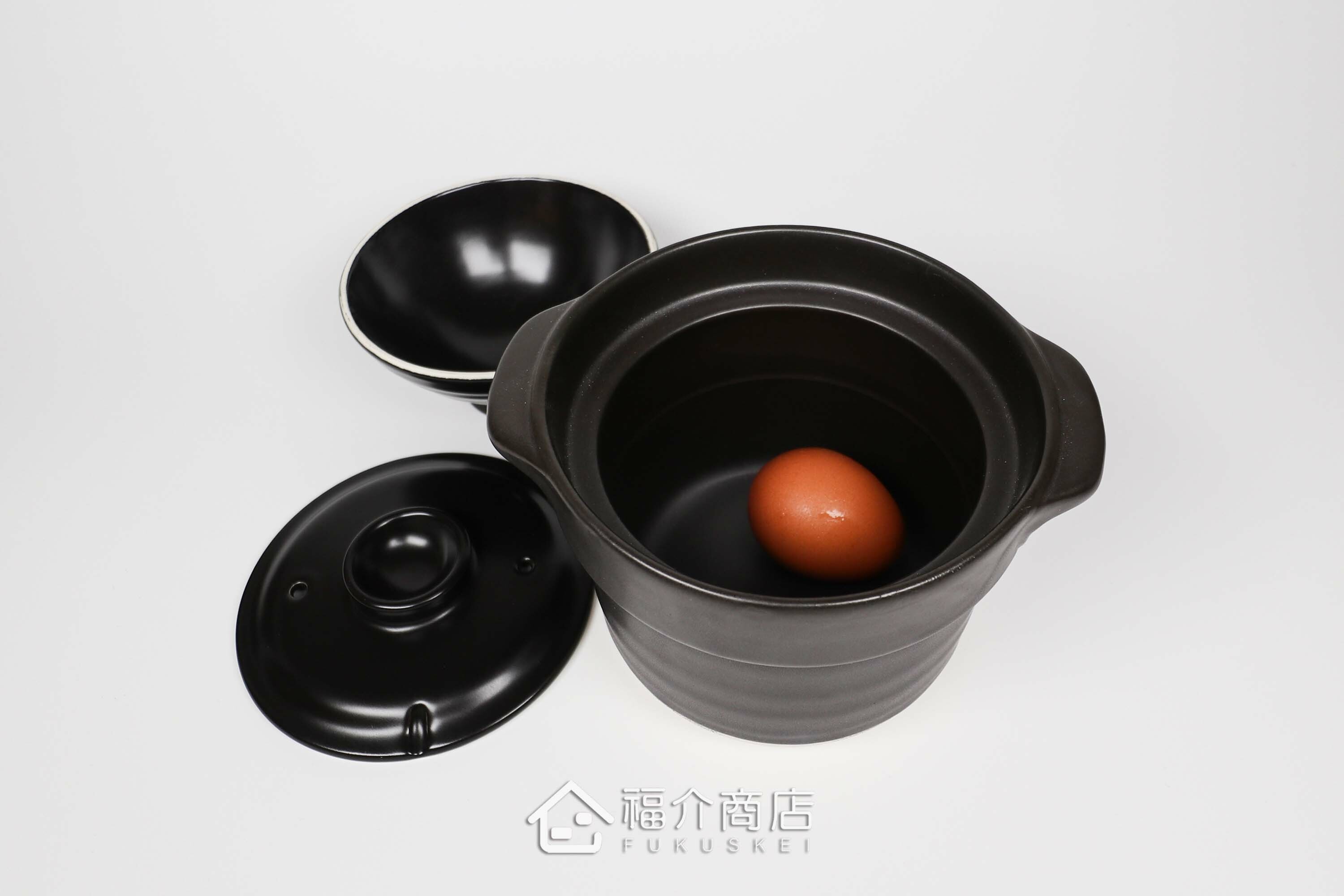 煮飯用陶瓷材質黑色雙層1杯米的飯鍋與土雞蛋