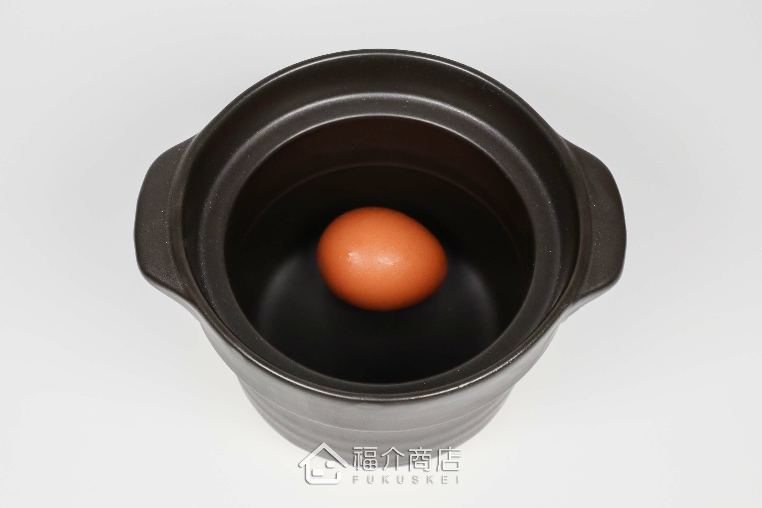 煮飯用陶瓷材質飯鍋與土雞蛋