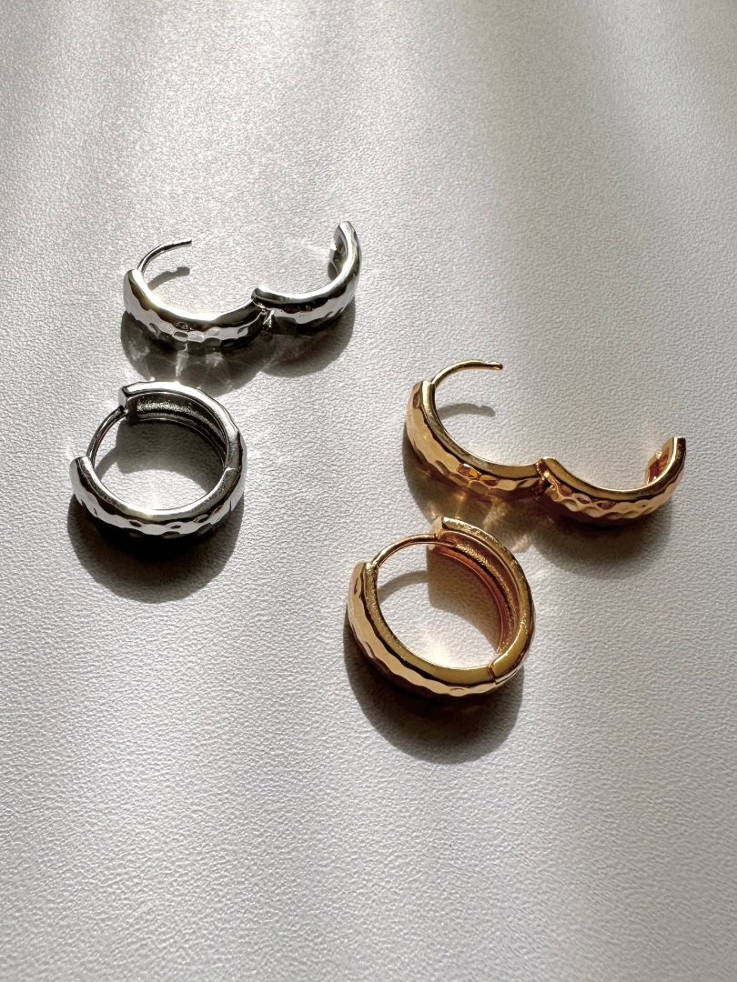 SS emboss hoop pierce