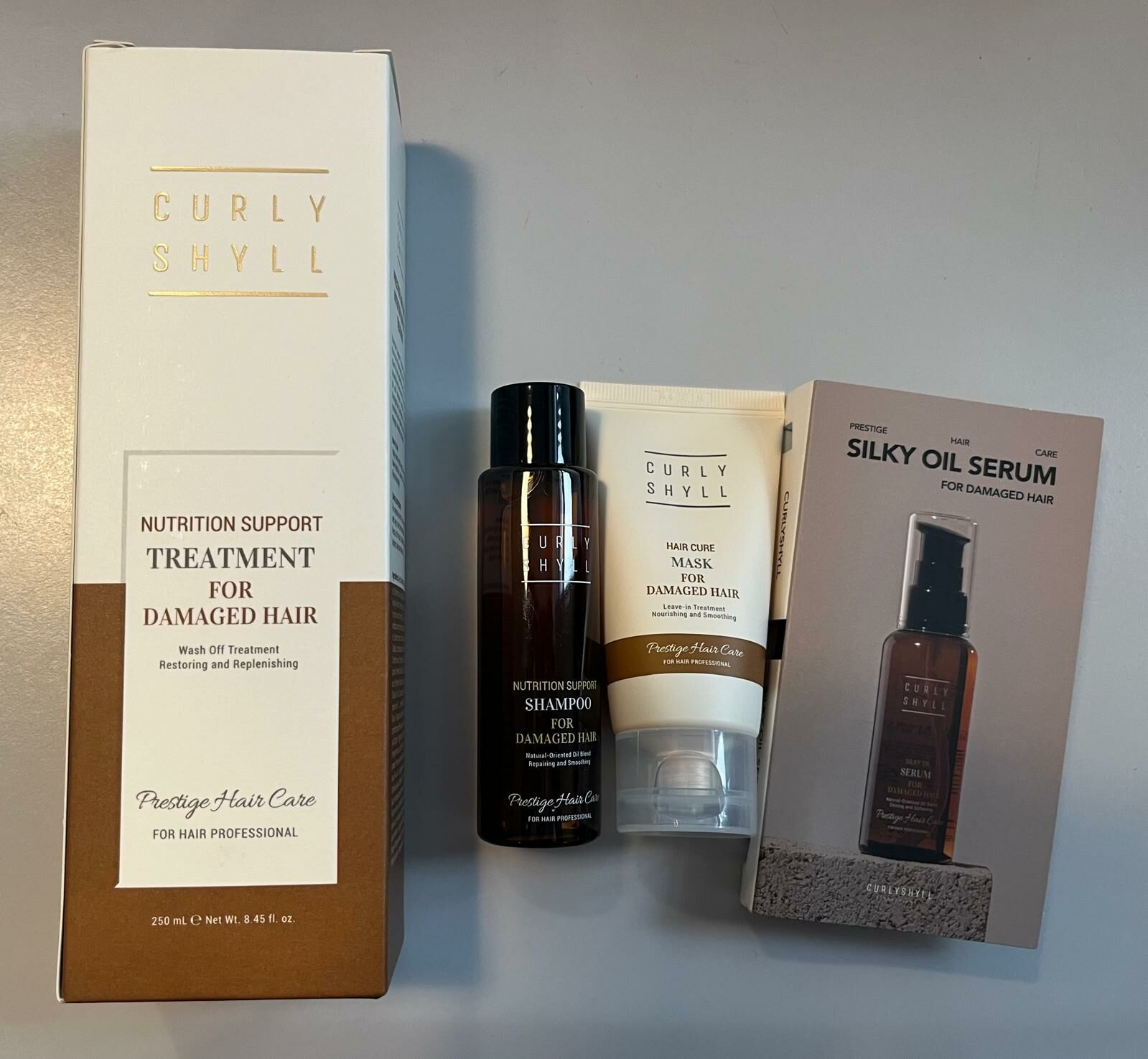 CURLY SHYLL 集中滋養修護髮膜 250ml + 贈品: 滋養修護洗髮露 50ml, 滋養修護免洗髮膜 40ml, 柔順絲滑護髮精華油 13ml