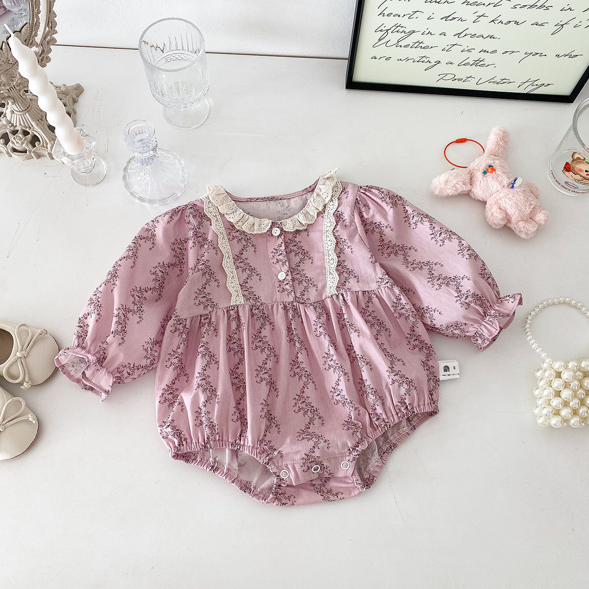 25 春款紫色碎花包屁洋裝