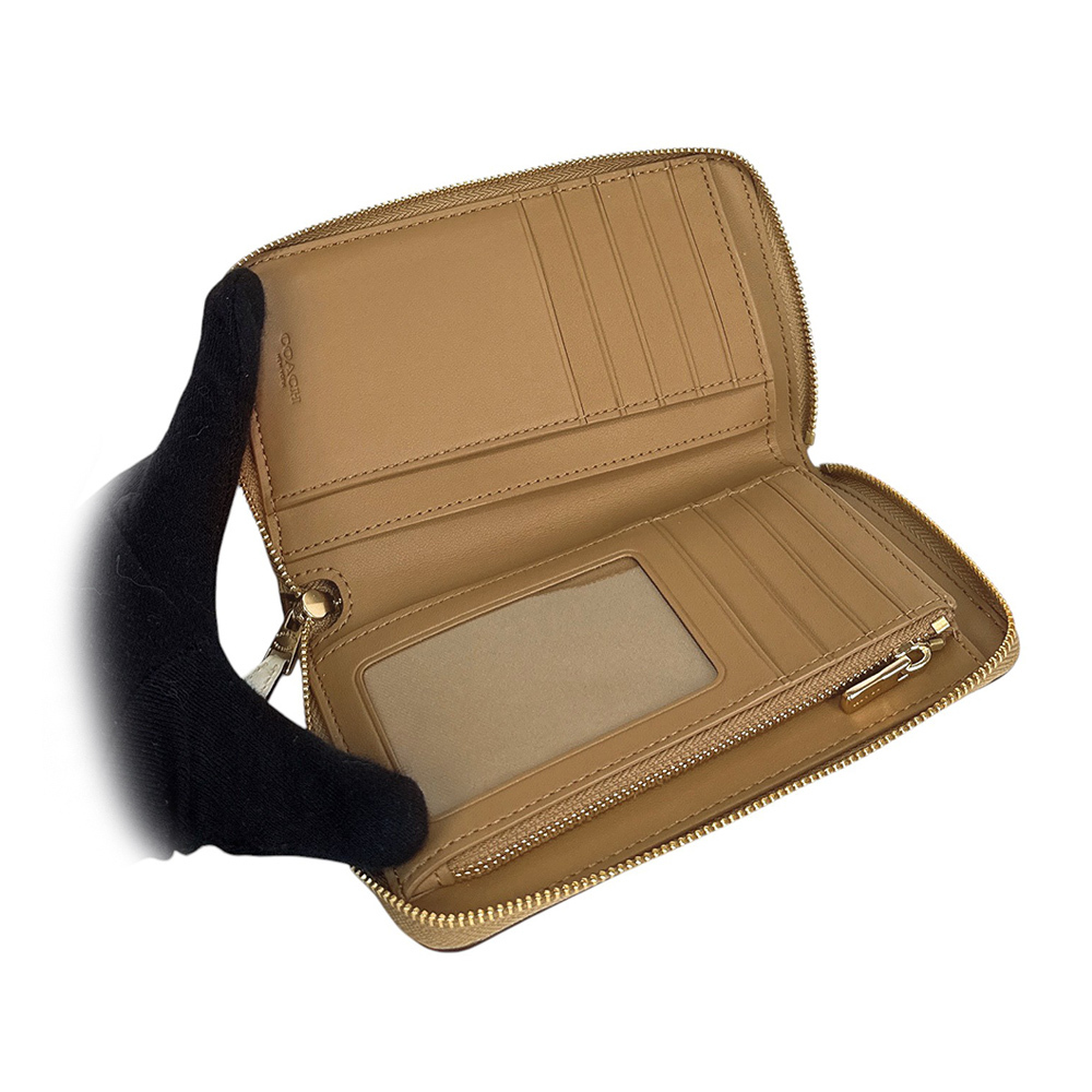 【COACH】金字Logo 塗層帆布ㄇ形拉鍊中夾(沙色/白色)CW781 IMXDM