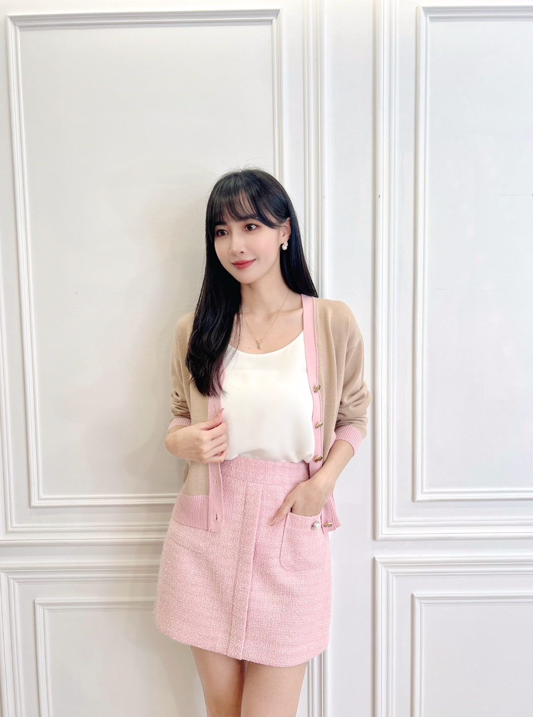 毛呢珍珠釦雙口袋短裙