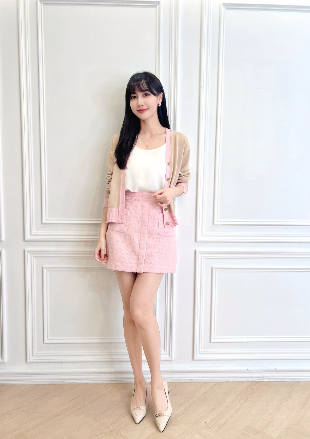 毛呢珍珠釦雙口袋短裙