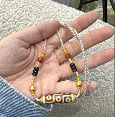 1 TG48 9-EYED DZI NECKLACE