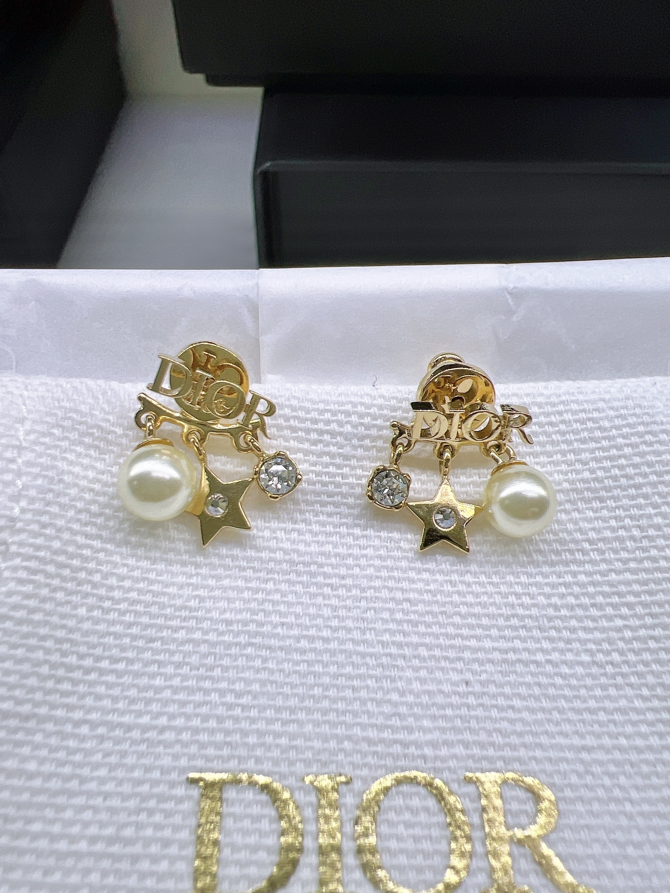 *Unused* Dior revolution earrings
