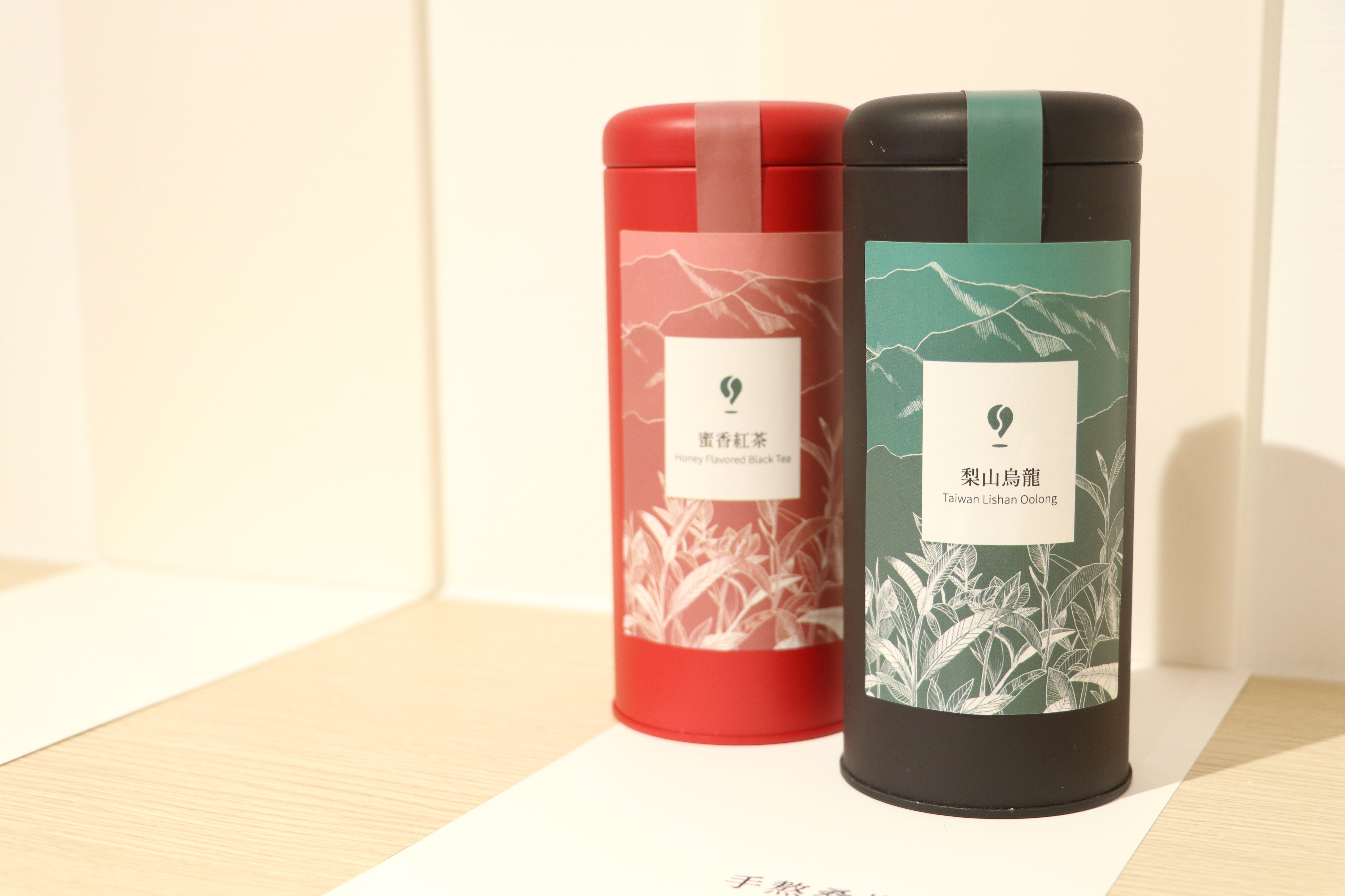 🍵 High-Mountain Tea Selections  Premium tea from Alishan and Lishan, capturing Taiwan’s tea culture and terroir.  🔹 Recommended Teas: ✔ Lishan Oolong Tea – Floral, lightly roasted, with a lingering sweet aftertaste. ✔ Honey-Infused Black Tea – Naturally sweet, with a rich amber hue.