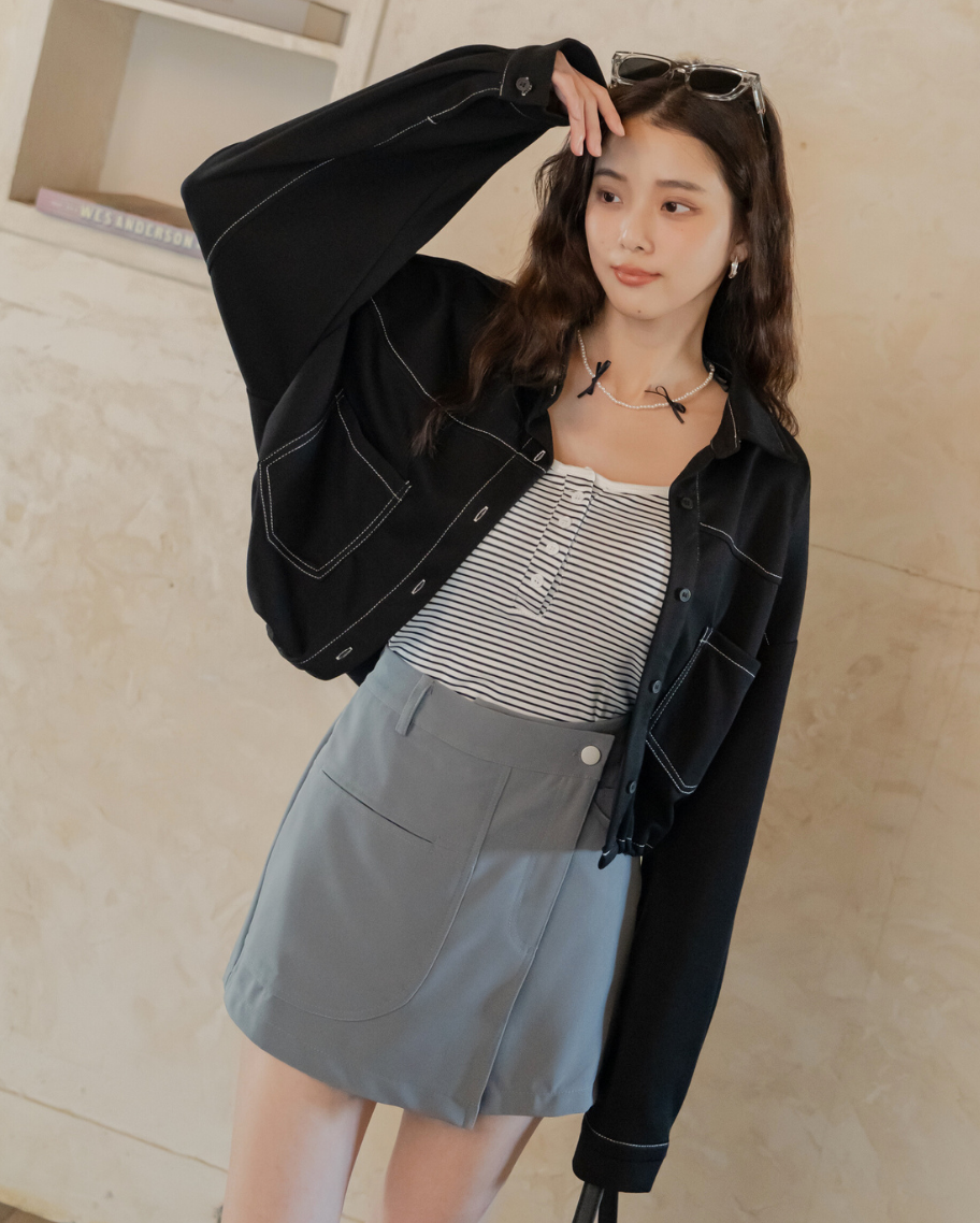 時髦不對稱剪接口袋褲裙