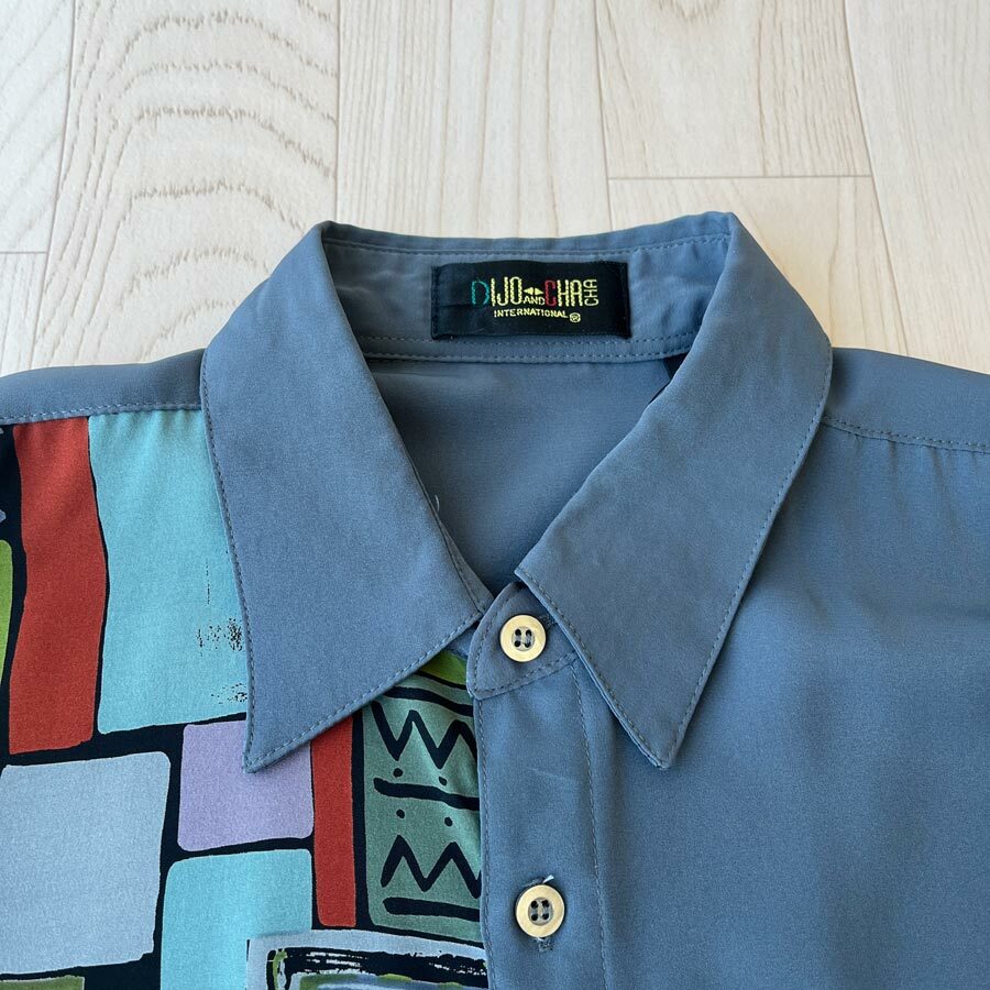 DIJO and CHACHA International湖水藍藝術圖案長袖恤衫