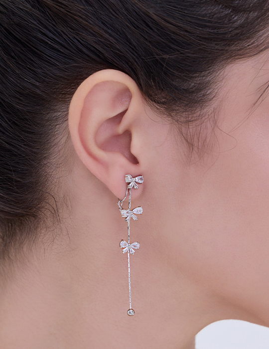 蝴蝶結流蘇。夾式耳環