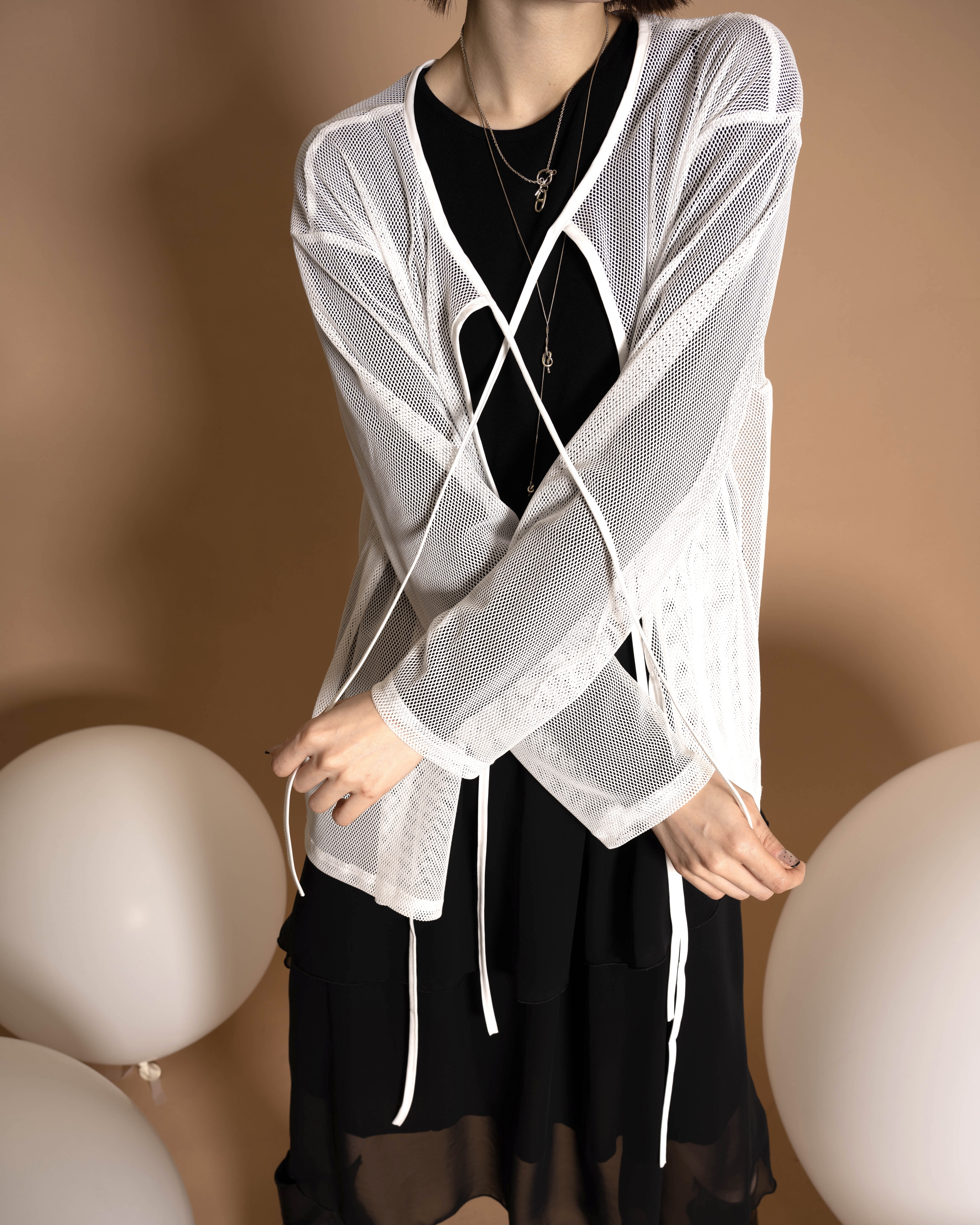 日系洞洞彈彈綁繩衫/1色均碼