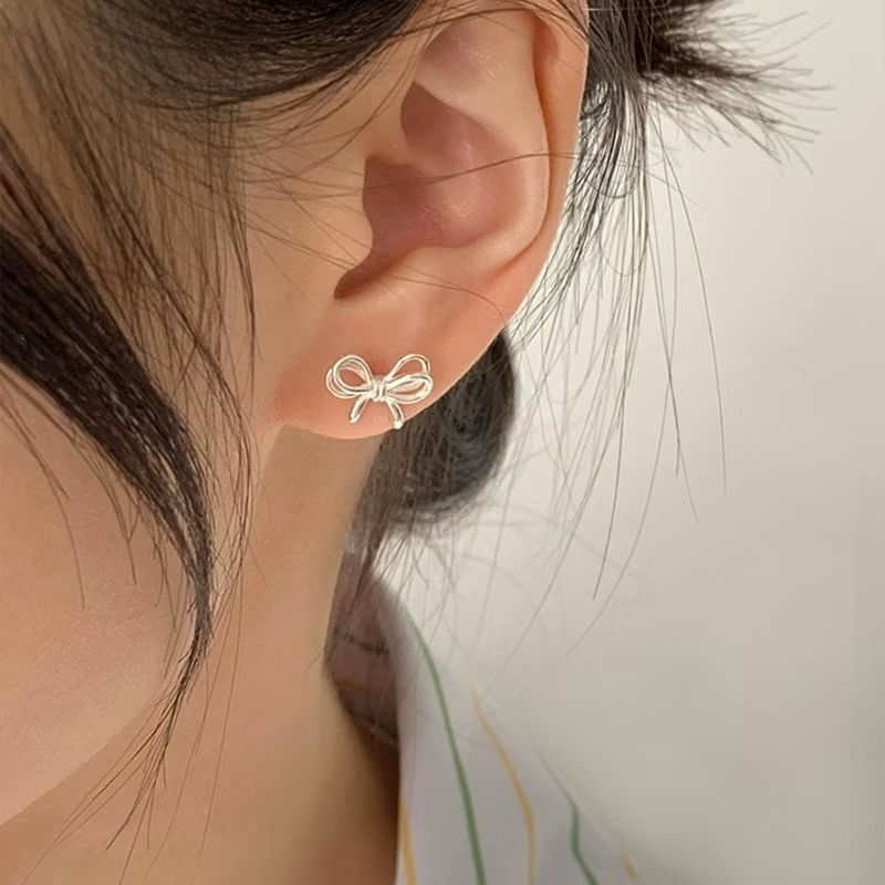 sweet立體鏤空金銀蝴蝶結耳釘