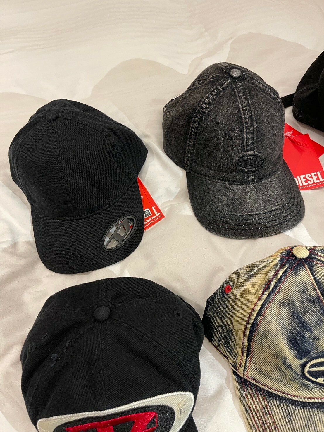 DIESEL 鏤空金屬Logo 黑色老帽