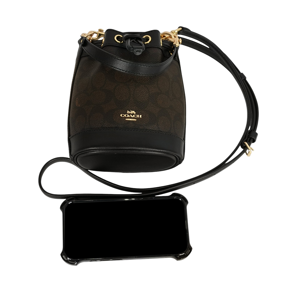 【COACH】金色馬車標誌塗層帆布及皮革迷你水桶包(胡桃木棕/黑色)CW299 IMXAQ