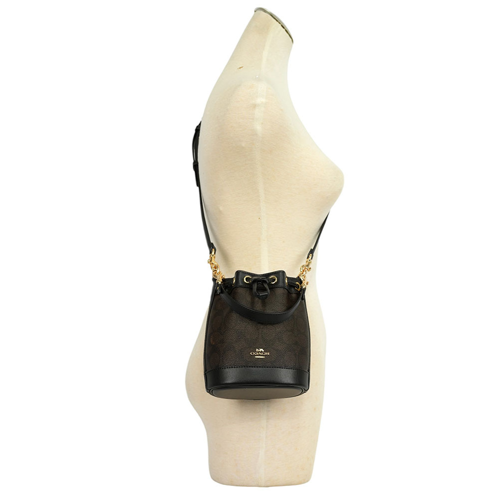 【COACH】金色馬車標誌塗層帆布及皮革迷你水桶包(胡桃木棕/黑色)CW299 IMXAQ