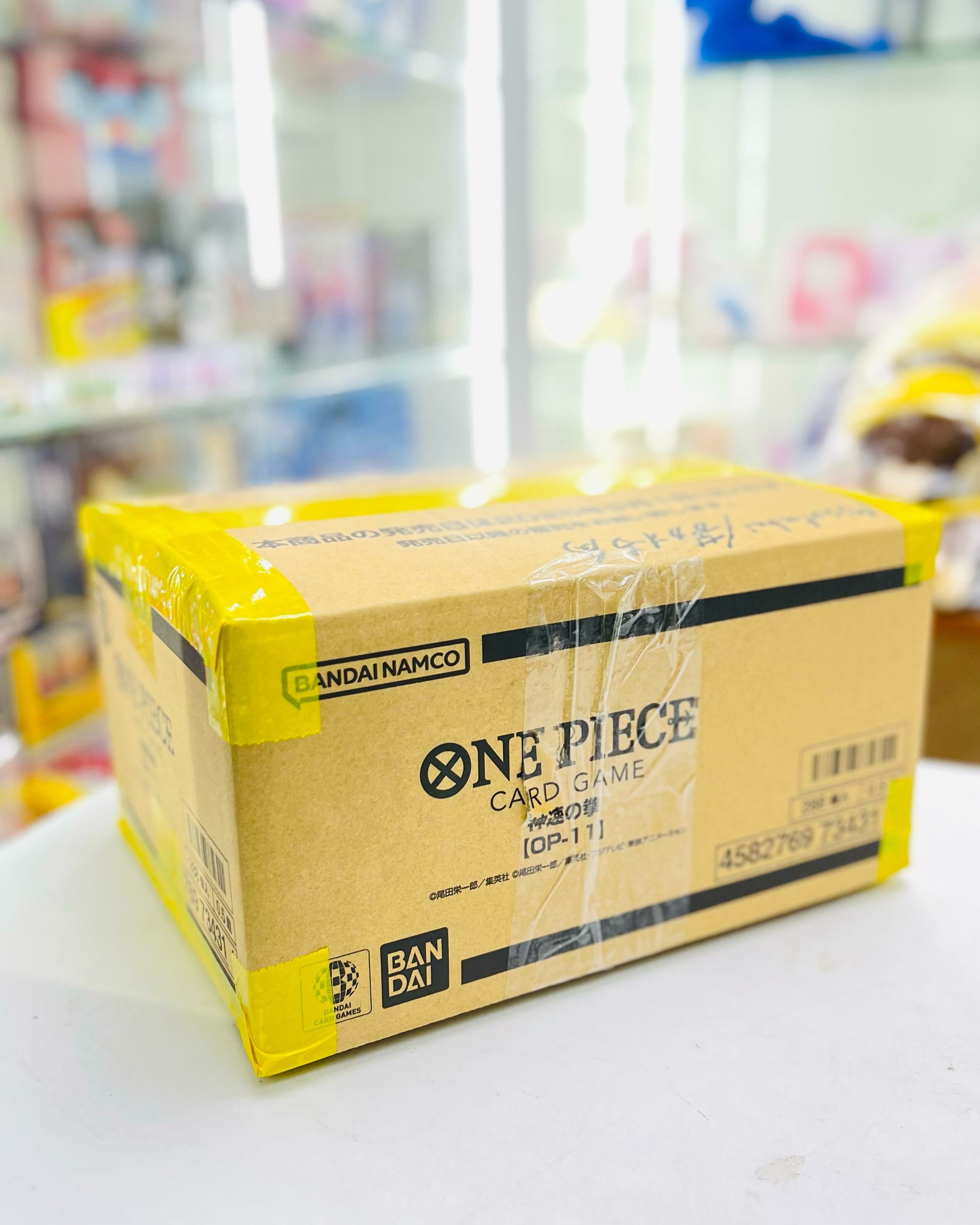 Bandai One Piece Card Game Card Game Booster Pack - OP11-A Fist of Divine Speed (CTN of 12 Boxes)