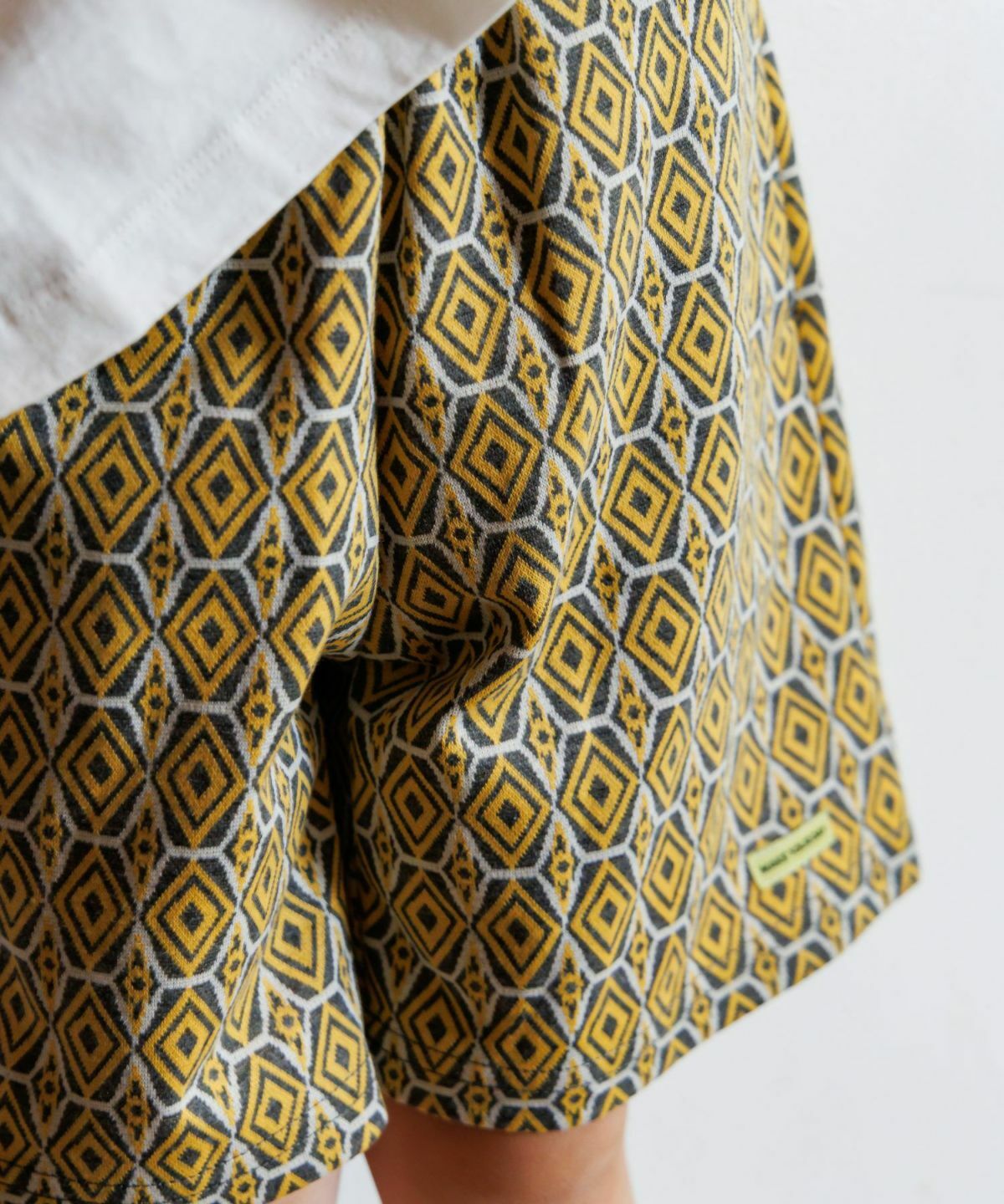 日本 MYD 緹花紋路 微寬五分休閒褲 (共2色，100) M520320