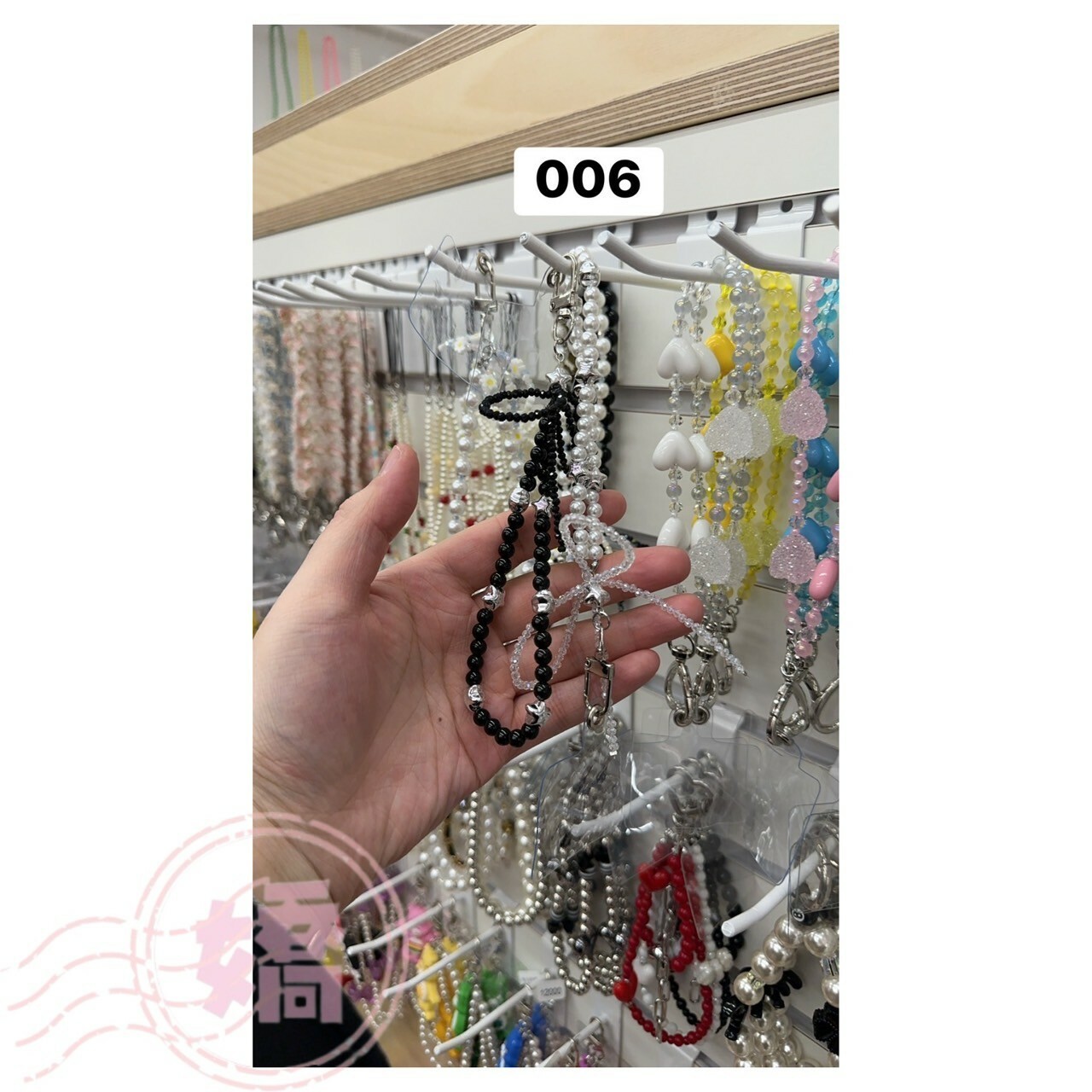 K30006串珍珠蝴蝶結掛飾(黑'白)