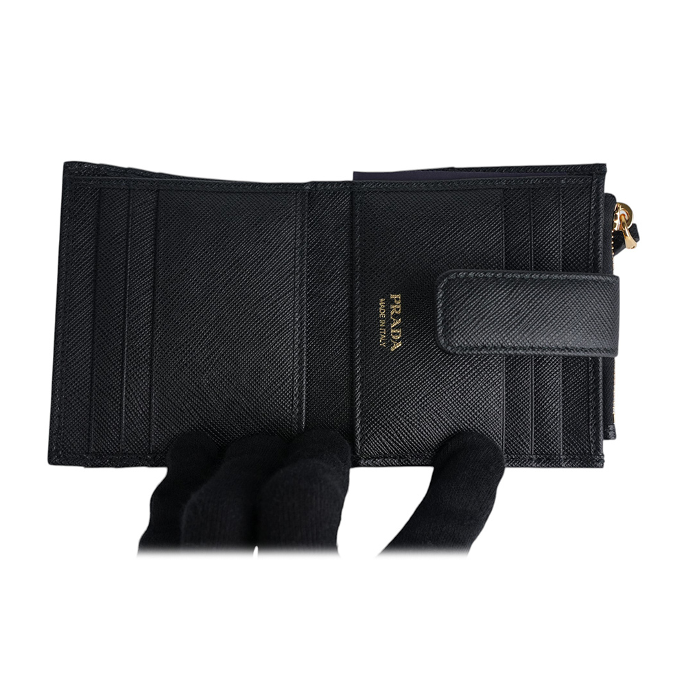 【PRADA】金字浮雕Logo 防刮牛皮卡片短夾(黑色)1ML047 QWA F0002