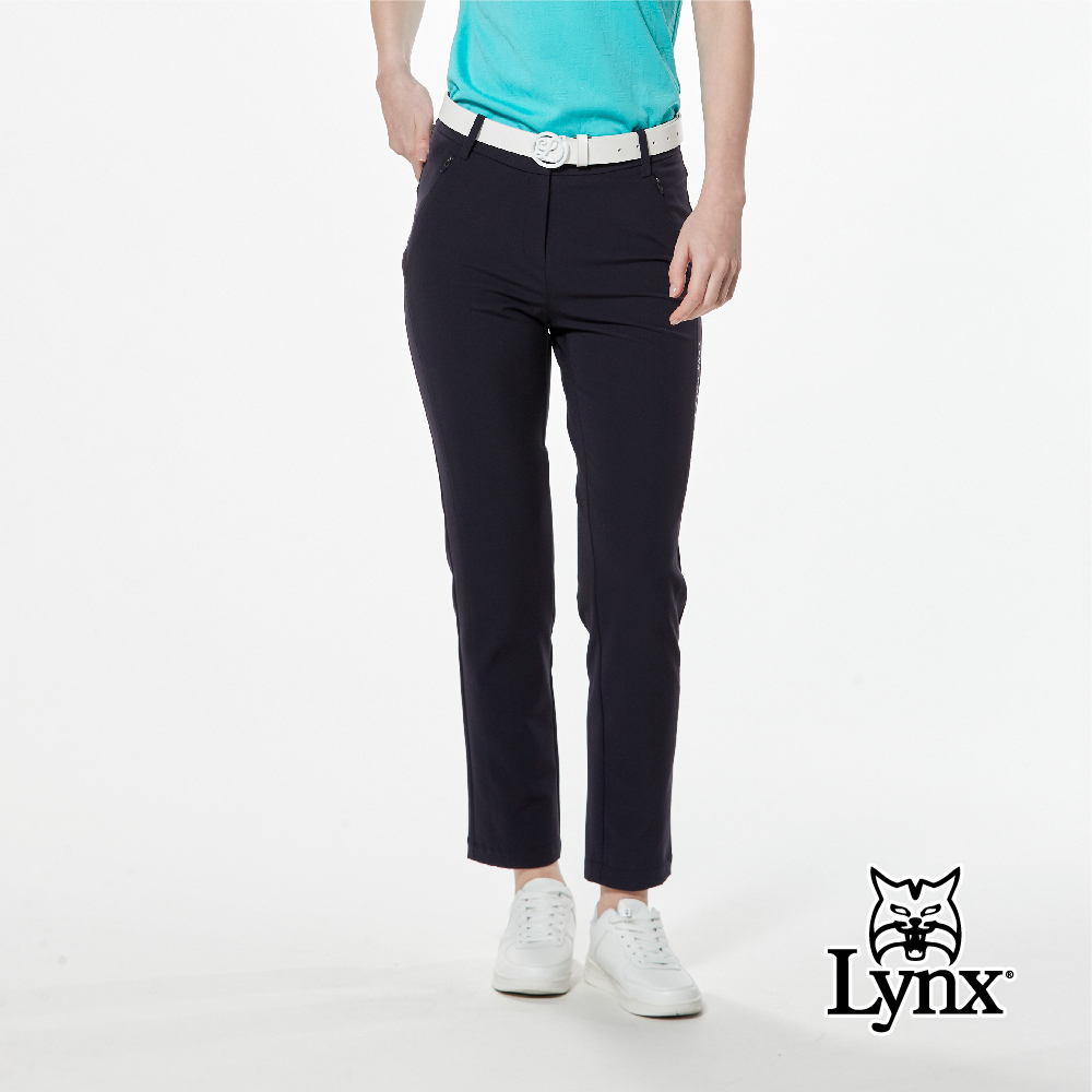 【Lynx Golf】四面彈性脇邊剪裁膠印隱形拉鍊口袋窄管九分褲