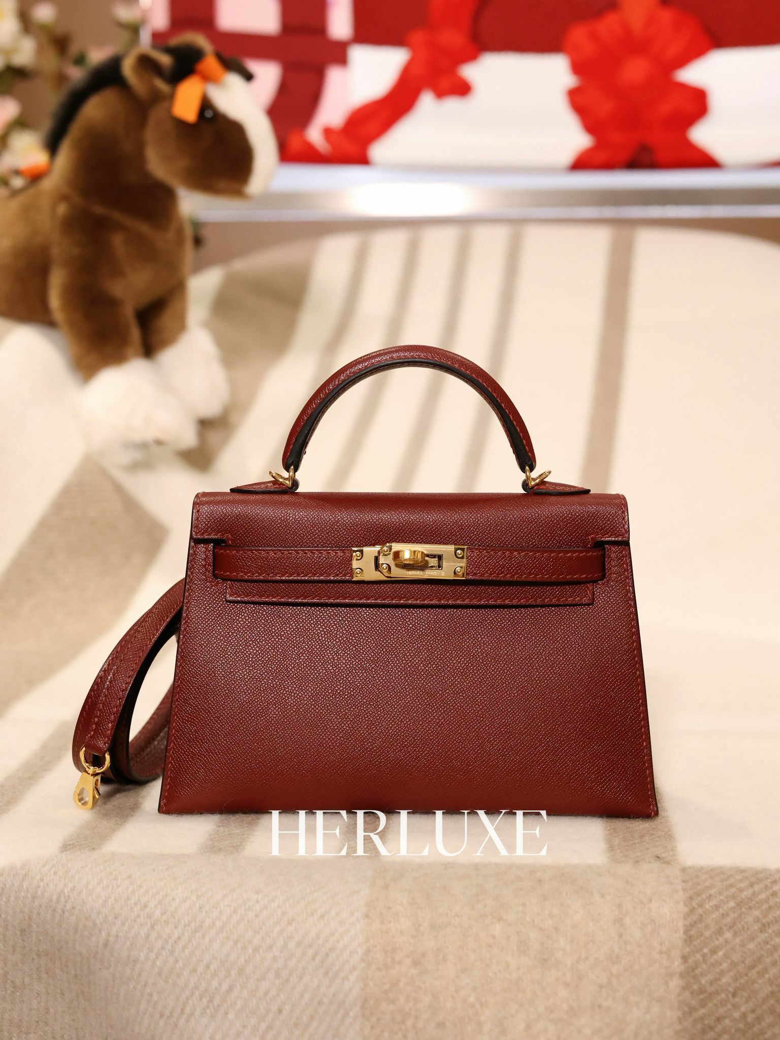 Kelly mini II 55 rouge H cc madame W