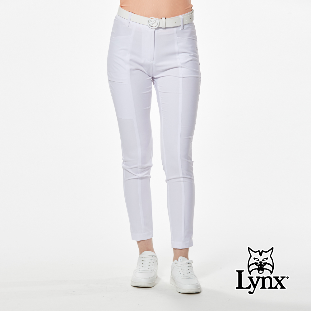 首爾高桿風格！素面LOGO織帶剪接褲口開杈窄管九分褲