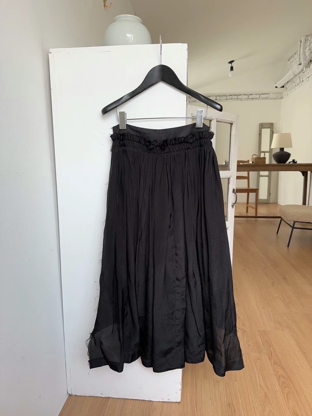 Asymmetrical black skirt